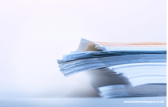 stack of papers on a desk