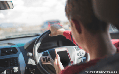 caught driving whilst using a mobile phone